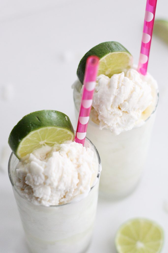 These Coconut Key Lime Floats aren't your grandma's boring root beer floats! This blissful treat is deceptively easy to make using homemade, no-churn ice cream and key lime soda. It's time to celebrate summer!