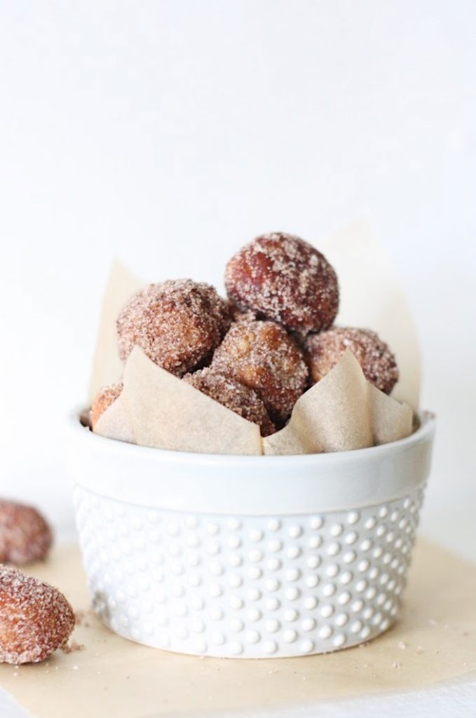 Cheat on your resolutions and treat yourself when you indulge on these Churro Donut Holes dipped in Caramel Sauce. Ready in no time at all, and reminiscent of your favorite coffee-house treat, these small bites are perfection!