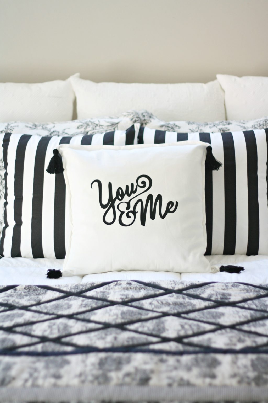 10 Silhouette CAMEO Projects for Beginners + a tutorial featured by Top US Craft Blog + The Pretty Life Girls + DIY Iron-On Graphic Pillow with Tassels