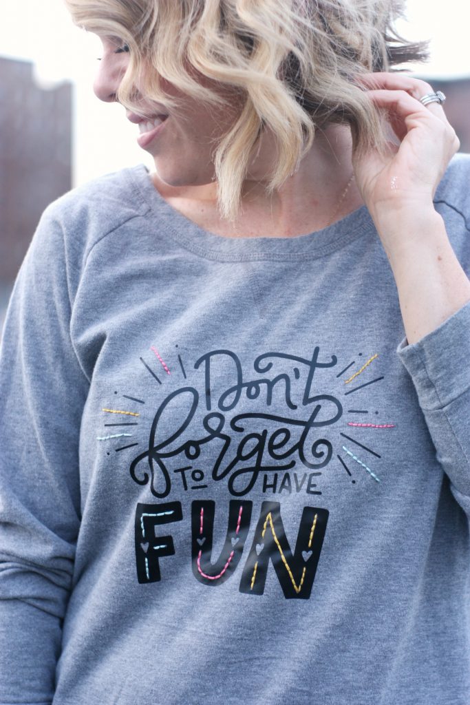 Heat Transfer & Embroidered DIY Sweatshirt tutorial featured by top US craft blog, The Pretty life Girls