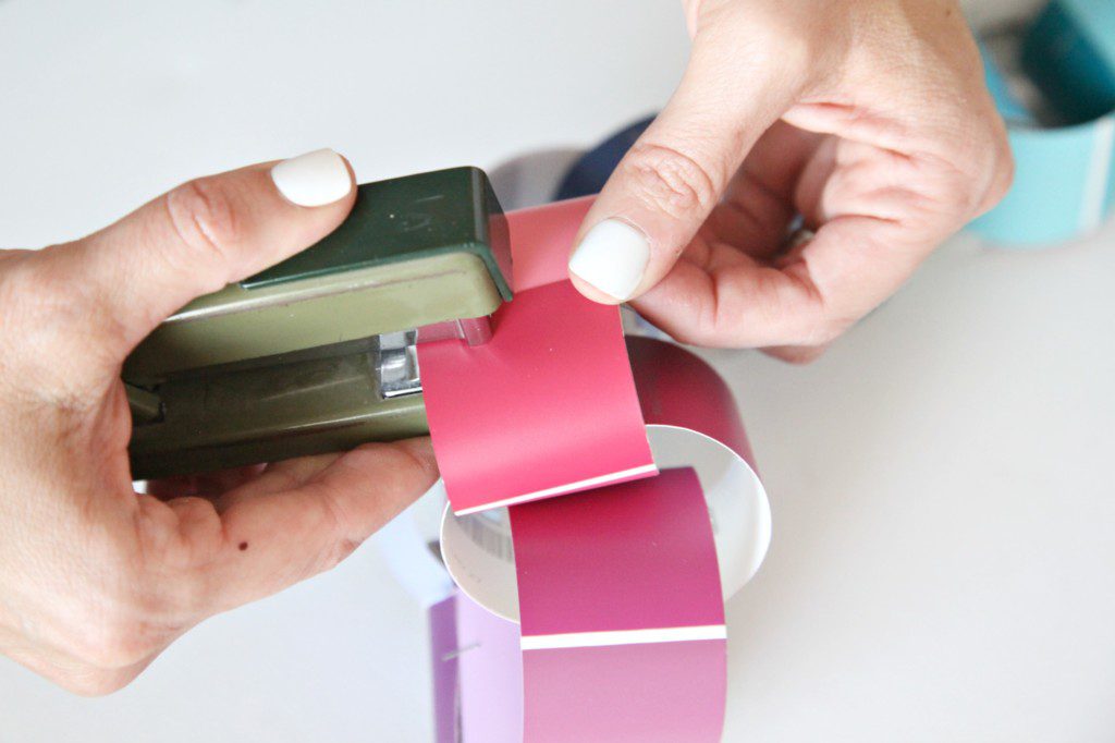 How to make a DIY Paint Chip Paper Chain Garland The Pretty Life Girls
