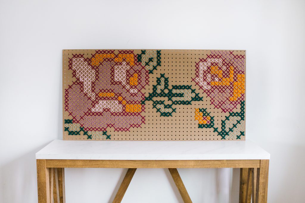 DIY Pegboard Cross Stitch Wall Art + a tutorial featured by Top US Craft Blog + The Pretty Life Girls: cross stitch close up