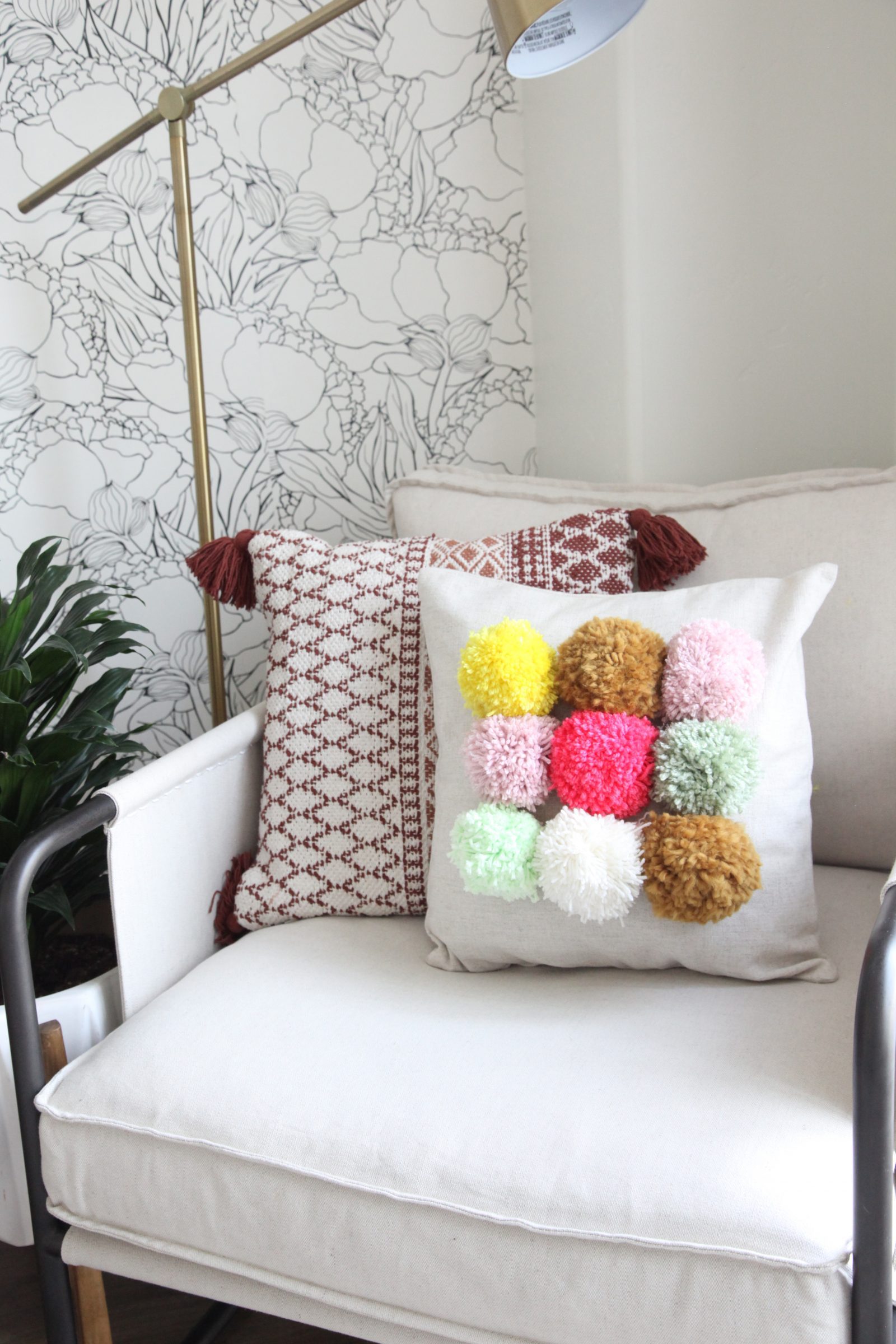 How to Make a Fluffy DIY Pom Pom Pillow + a tutorial featured by Top US Craft Blog + The Pretty Life Girls