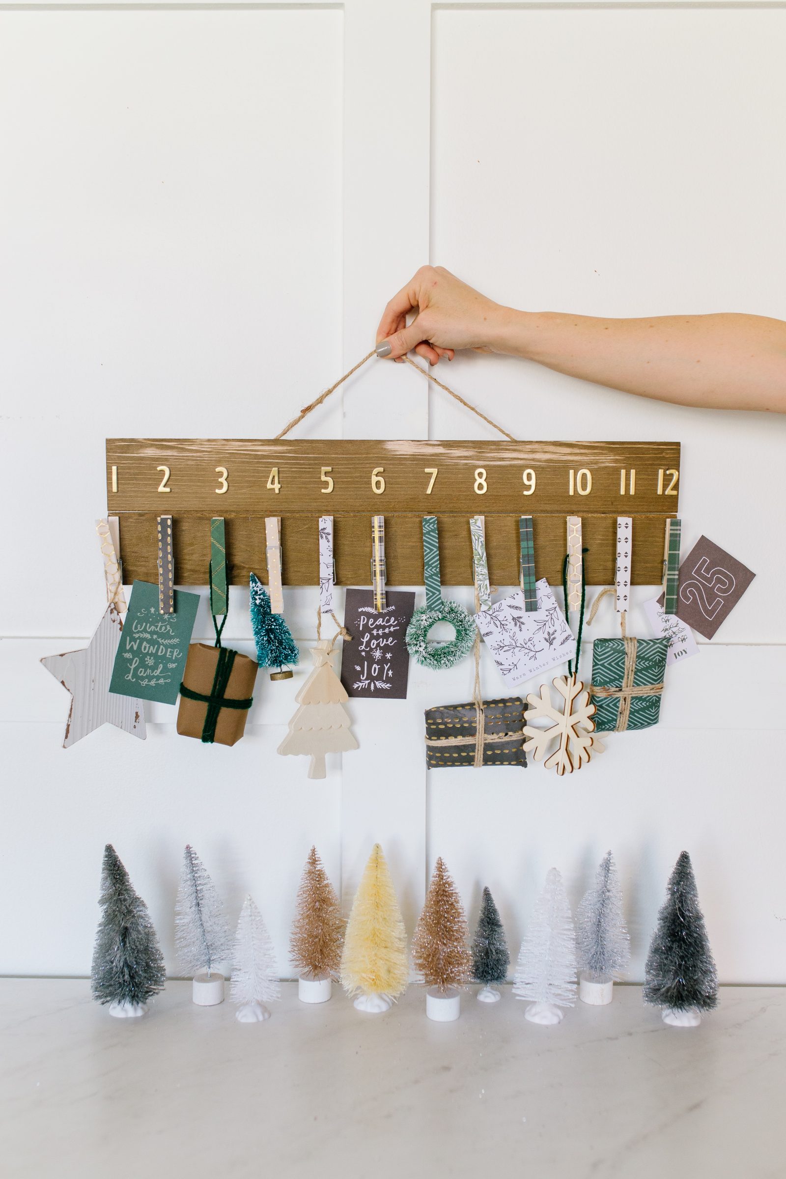 DIY Clothespin Advent Calendar Wall Hanging + a tutorial featured by Top US Craft Blog + The Pretty Life Girls