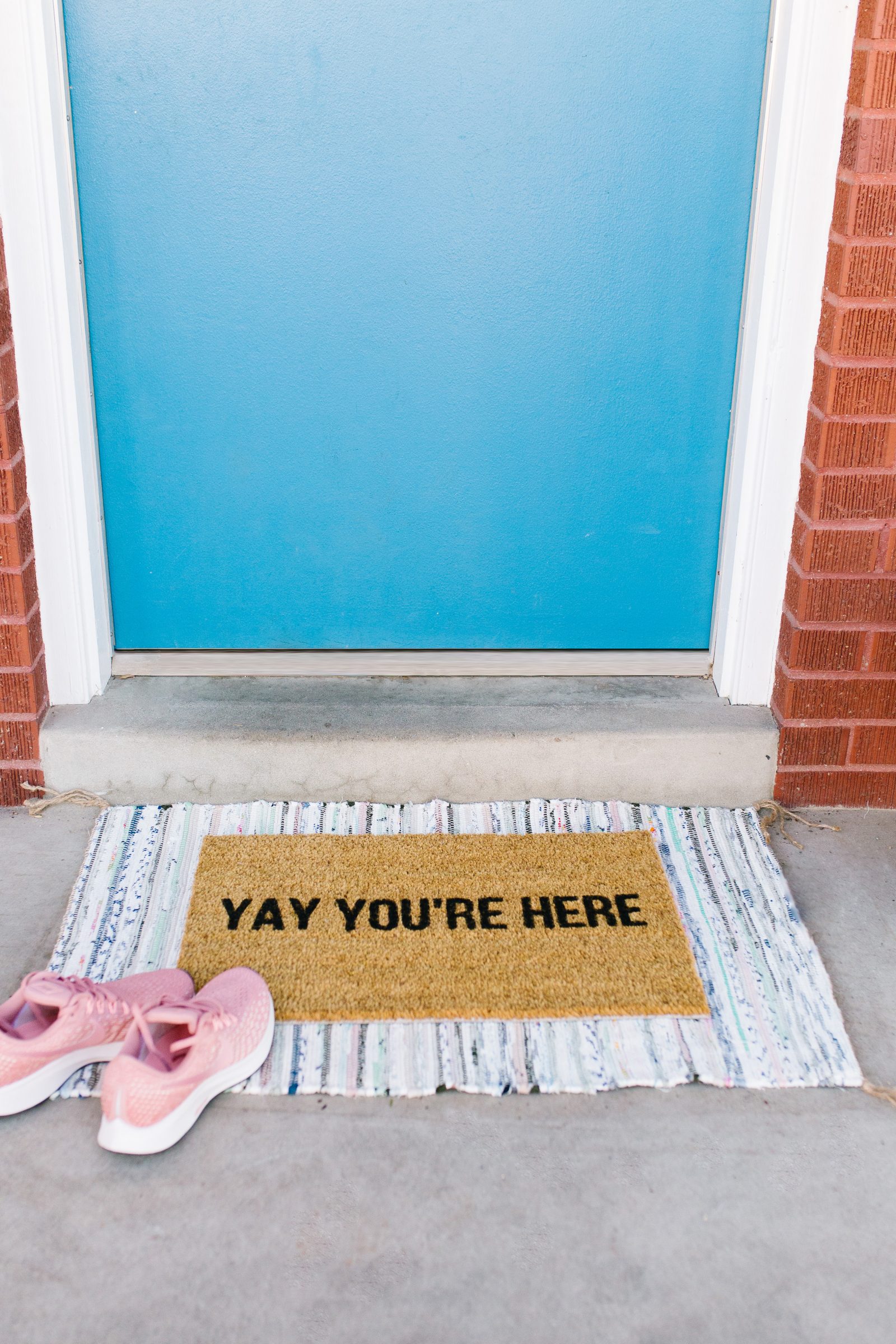 DIY Doormat: How to Make a Stenciled Doormat + a tutorial featured by Top US Craft Blog + The Pretty Life Girls